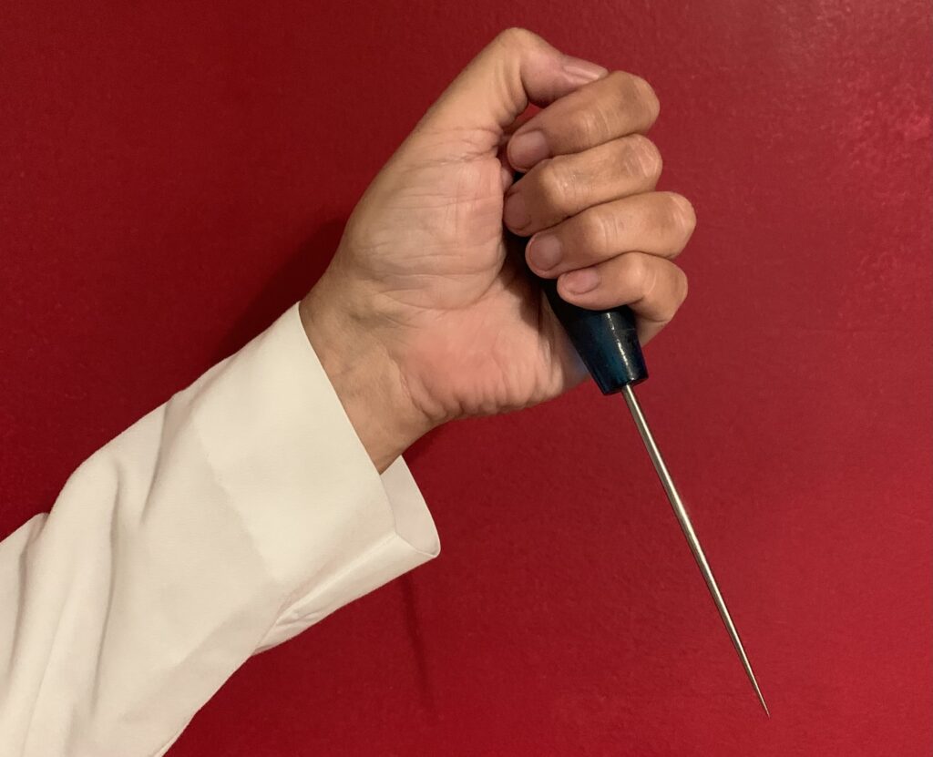 Ice pick held by doctor